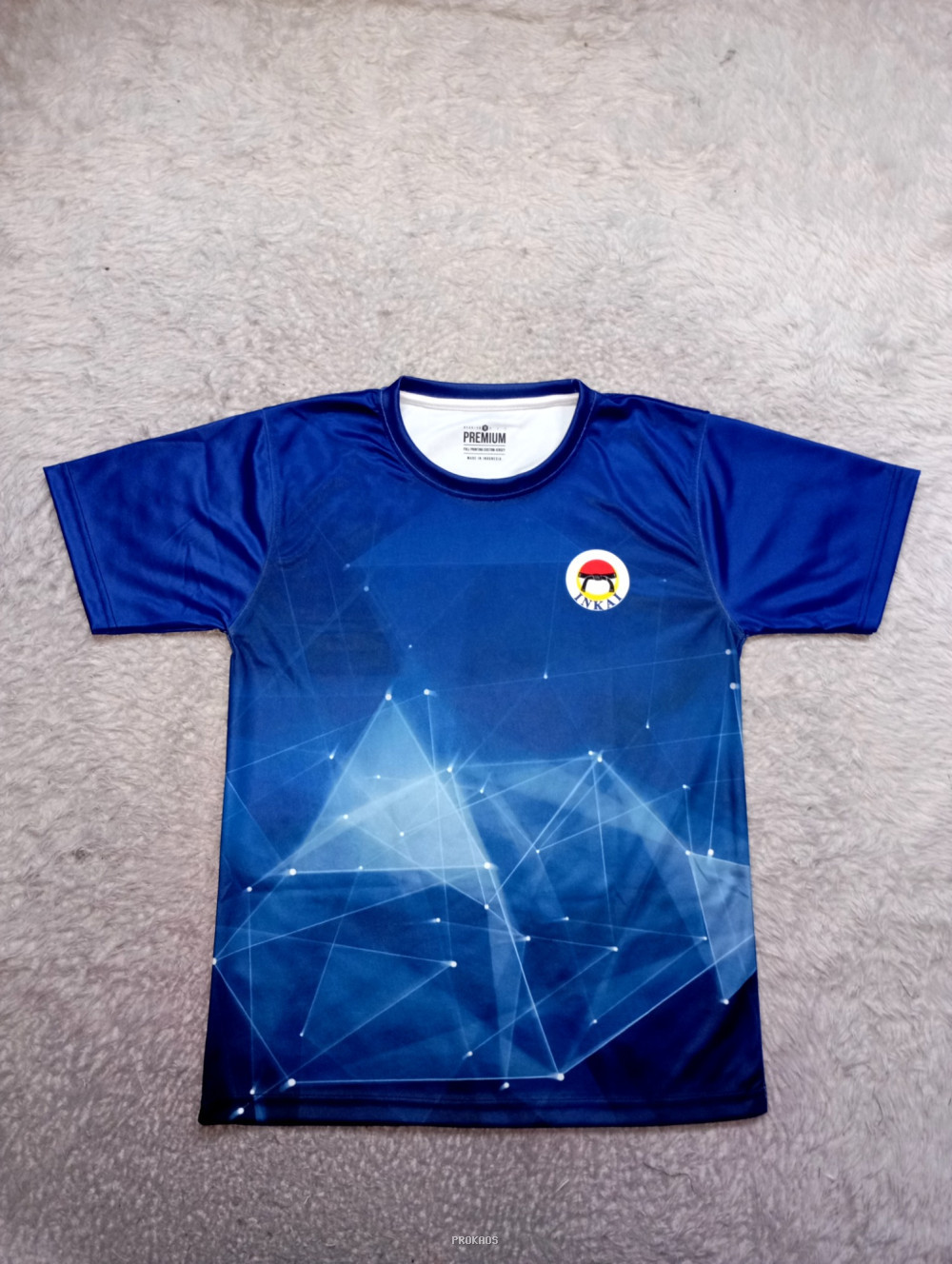 Jersey Beladiri Biru Gelap dengan Desain Geometris dan Logo - Jersey Custom PROKAOS