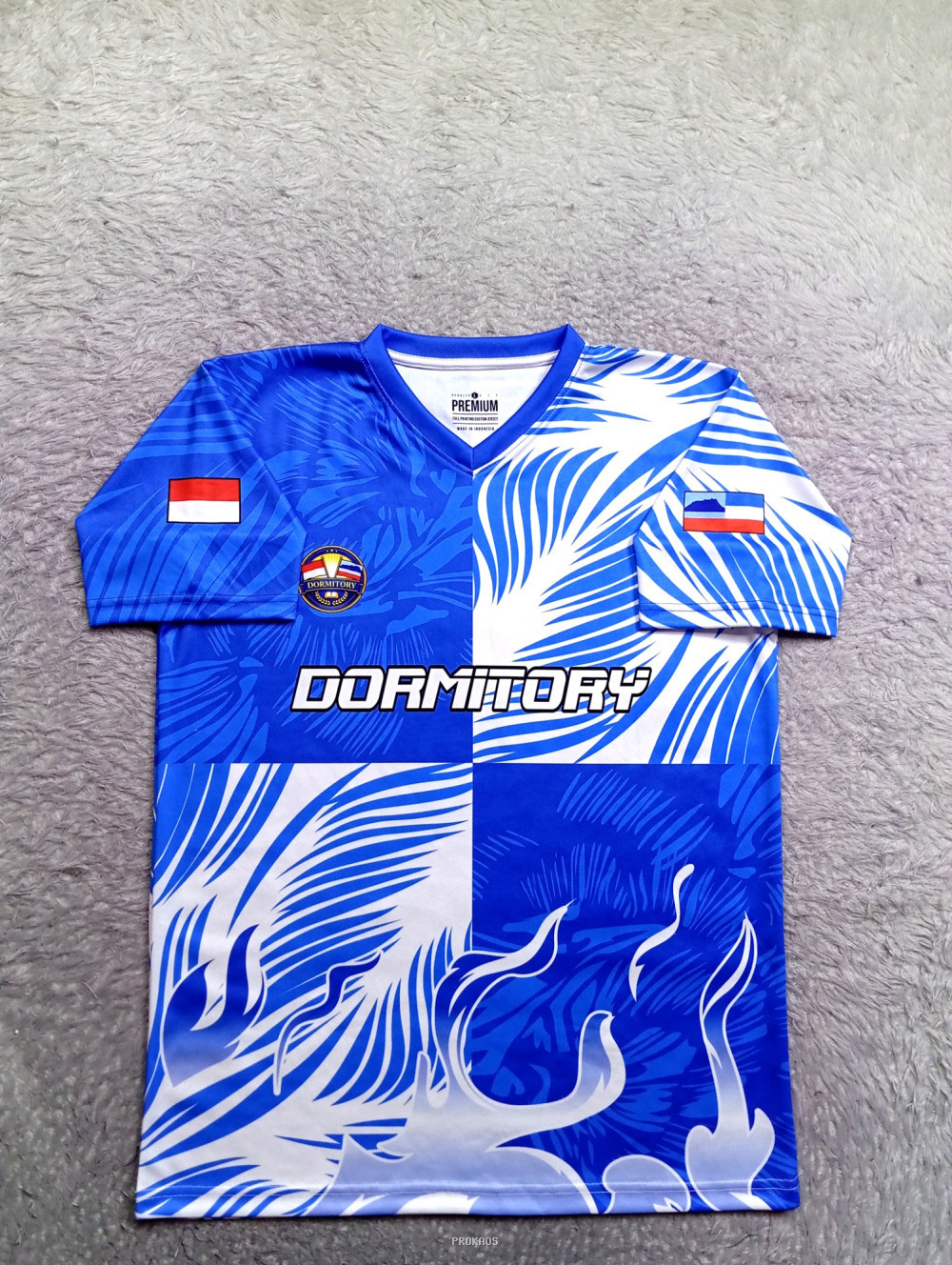 Jersey Dormitory Biru: Desain Unik dengan Motif Api & Daun - Jersey Custom PROKAOS
