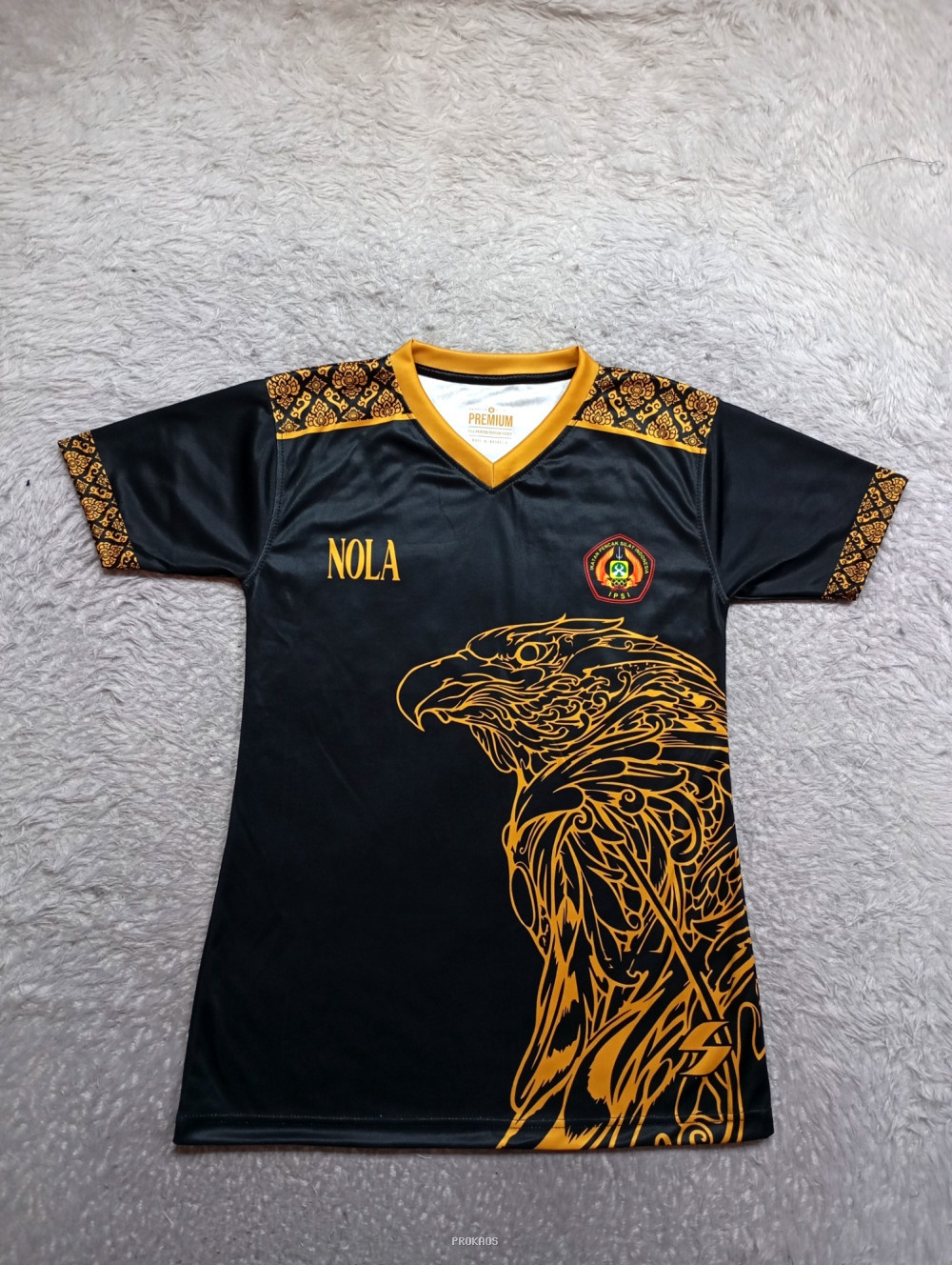 Jersey Hitam Elang Emas dengan Motif Batik dan Detail Nola - Jersey Custom PROKAOS