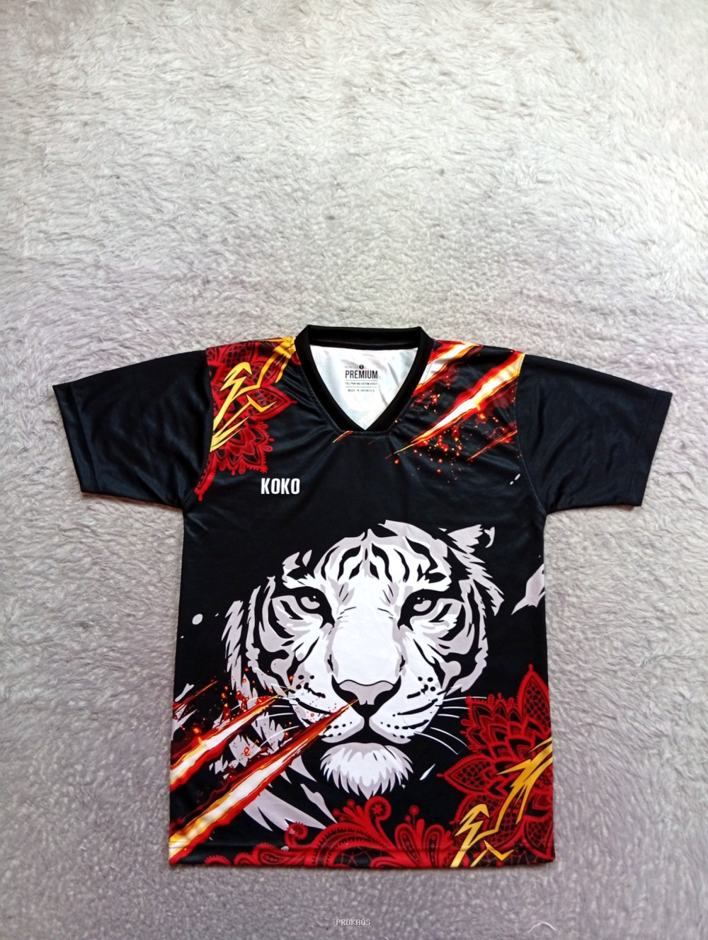 Jersey Hitam Motif Harimau dengan Ornamen Merah-Emas - Jersey Custom PROKAOS