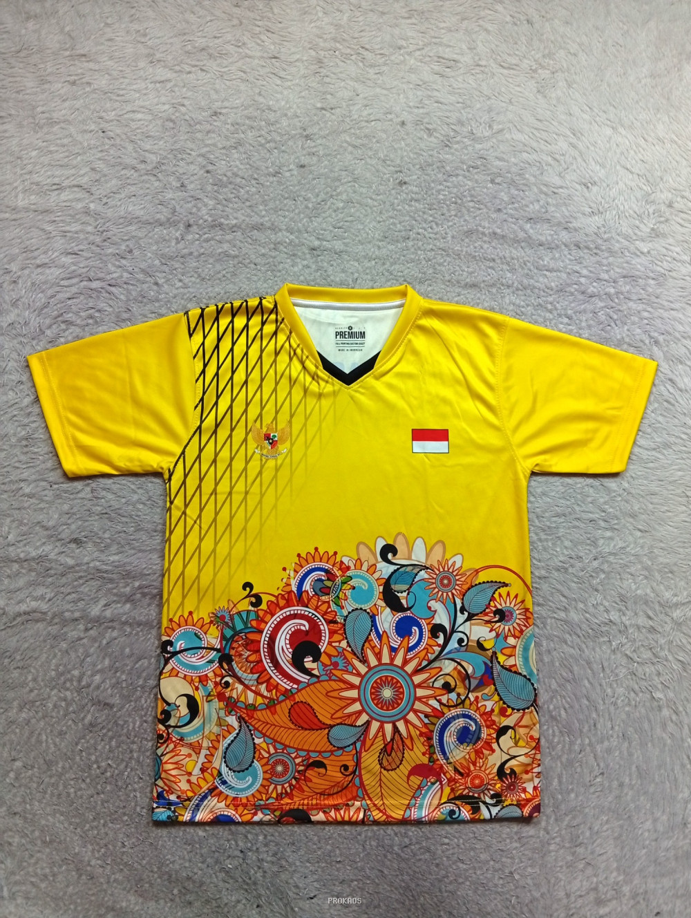 Jersey Kuning dengan Motif Bunga dan Elemen Nasionalis - Jersey Custom PROKAOS