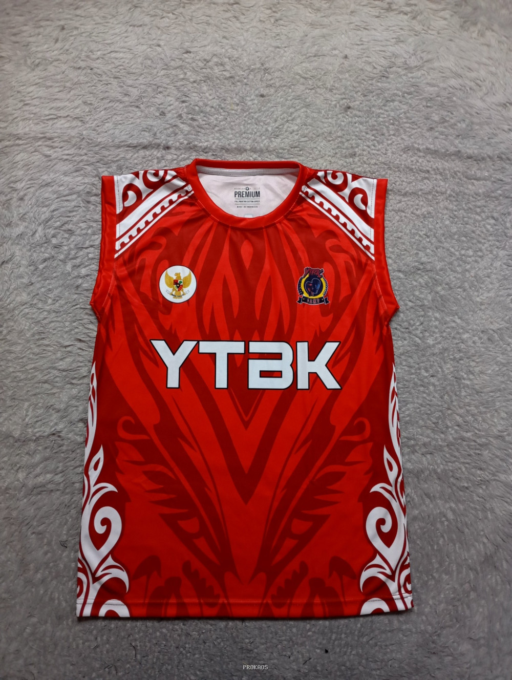Jersey Merah YTBK dengan Motif Tribal dan Logo Garuda - Jersey Custom PROKAOS