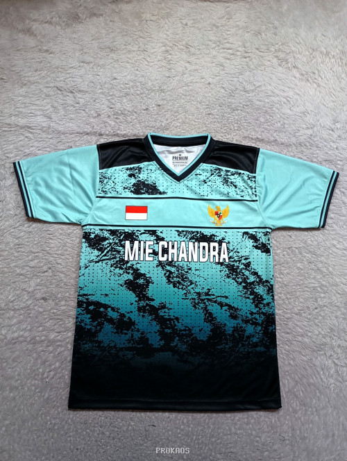 Jersey Mie Chandra: Kombinasi Warna Biru, Hitam, & Motif Gradasi - Jersey Custom PROKAOS