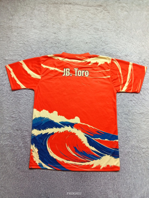 Jersey Oranye 'Tindak Ziarah' dengan Desain Ombak - Gambar 2