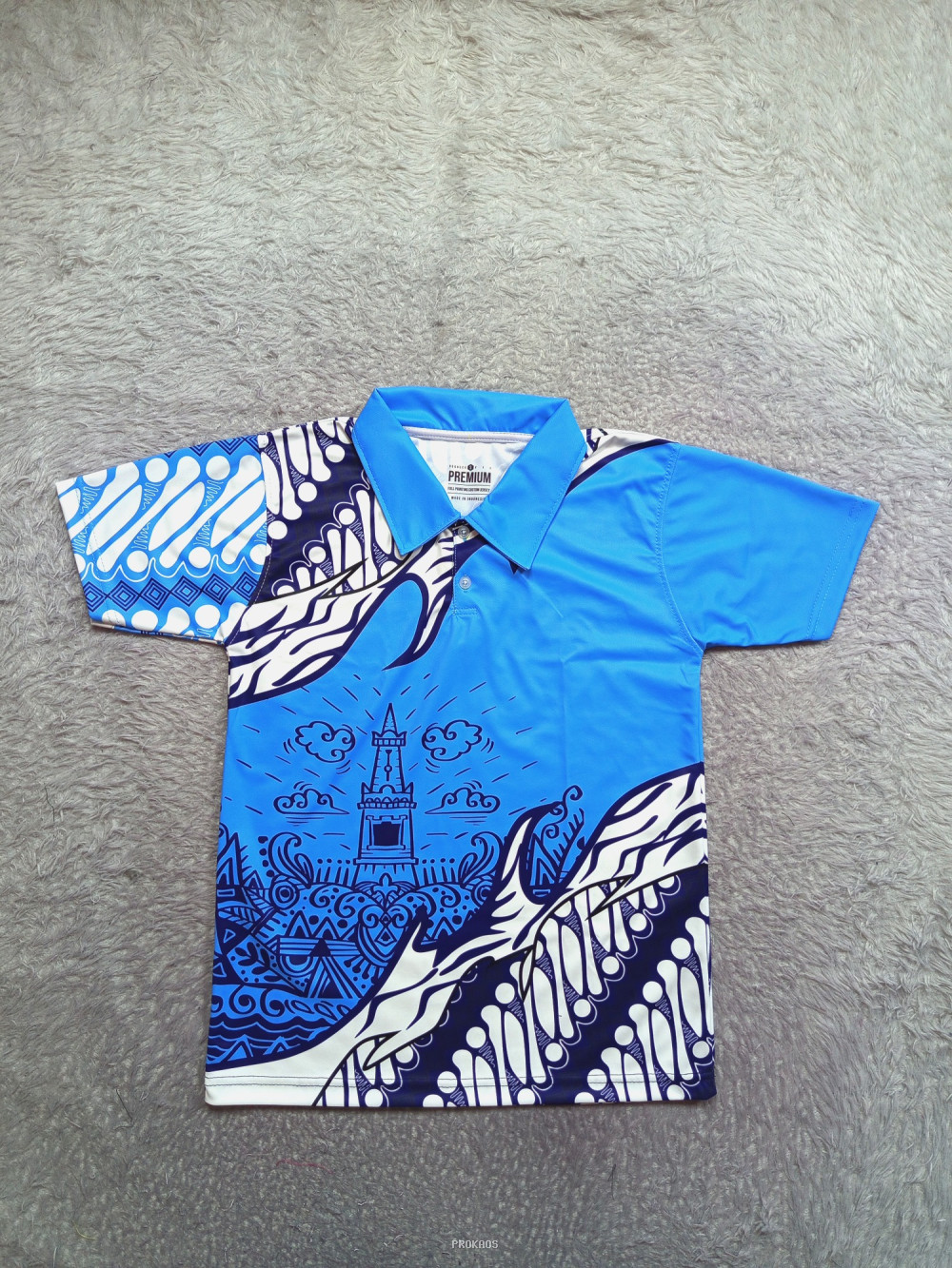 Jersey Polo Biru dengan Motif Batik Khas Kota - Jersey Custom PROKAOS