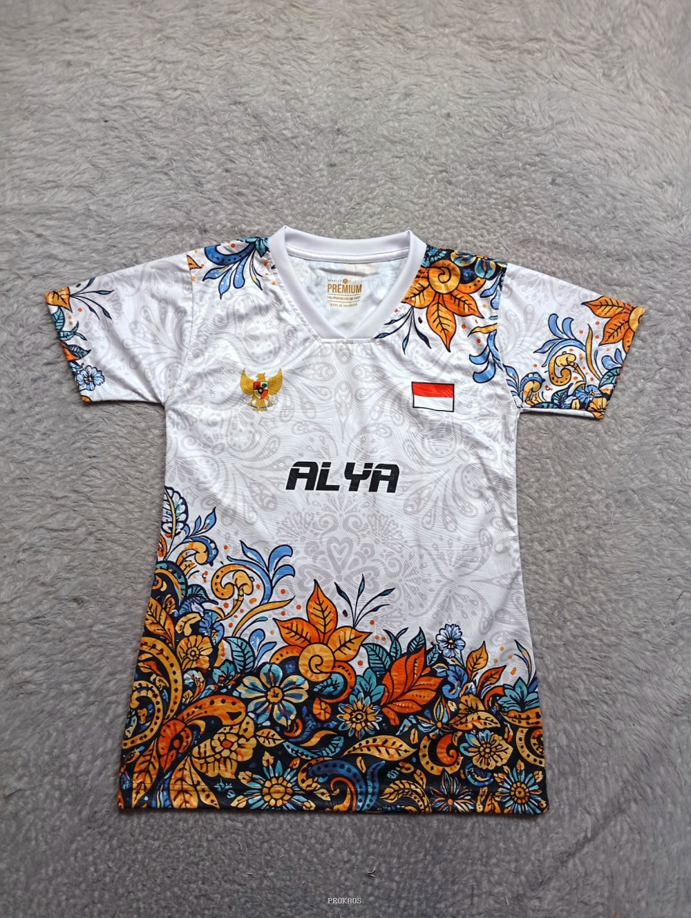 Jersey Putih Alva dengan Ornamen Batik dan Simbol Nasional - Jersey Custom PROKAOS