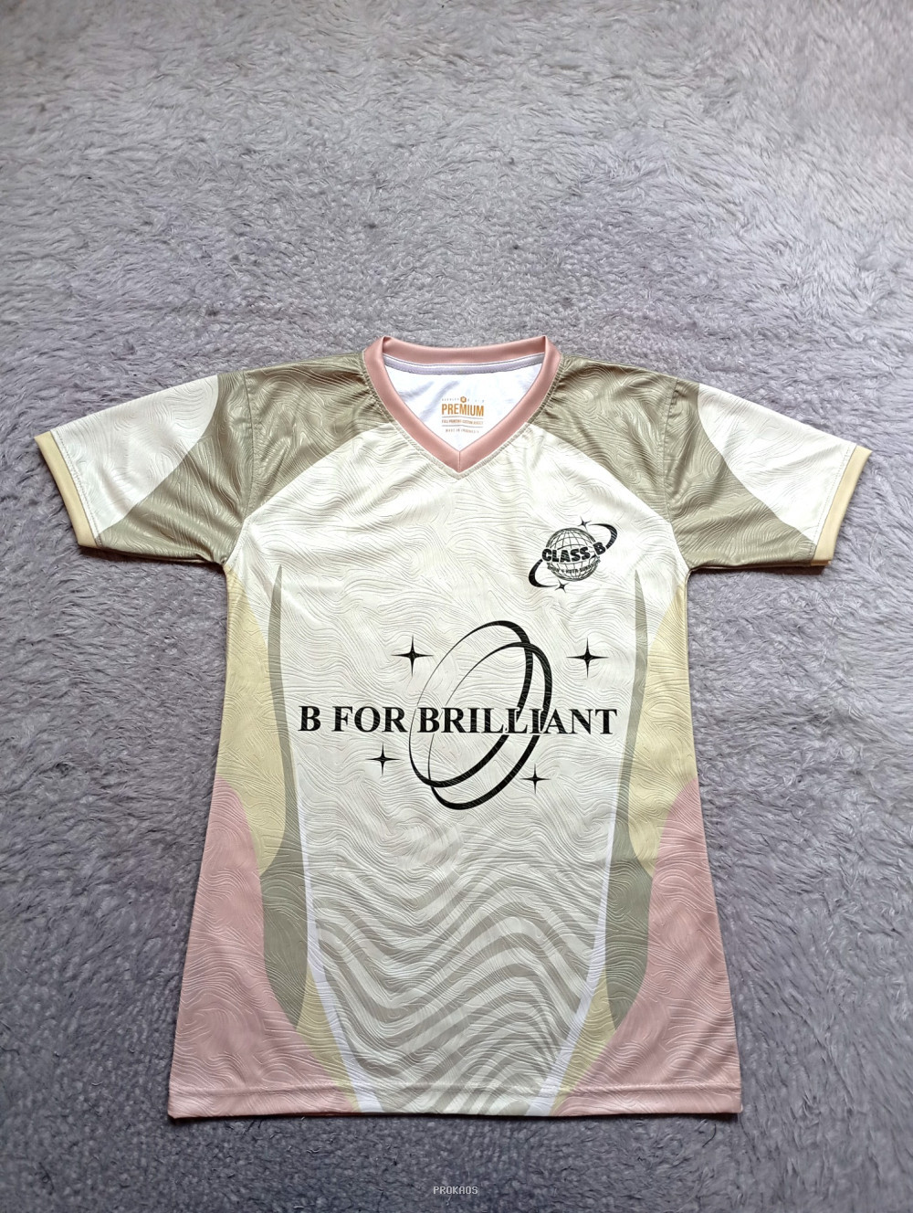 Jersey Putih Desain Modern dengan Logo 'Class B' dan 'B For Brilliant' - Jersey Custom PROKAOS