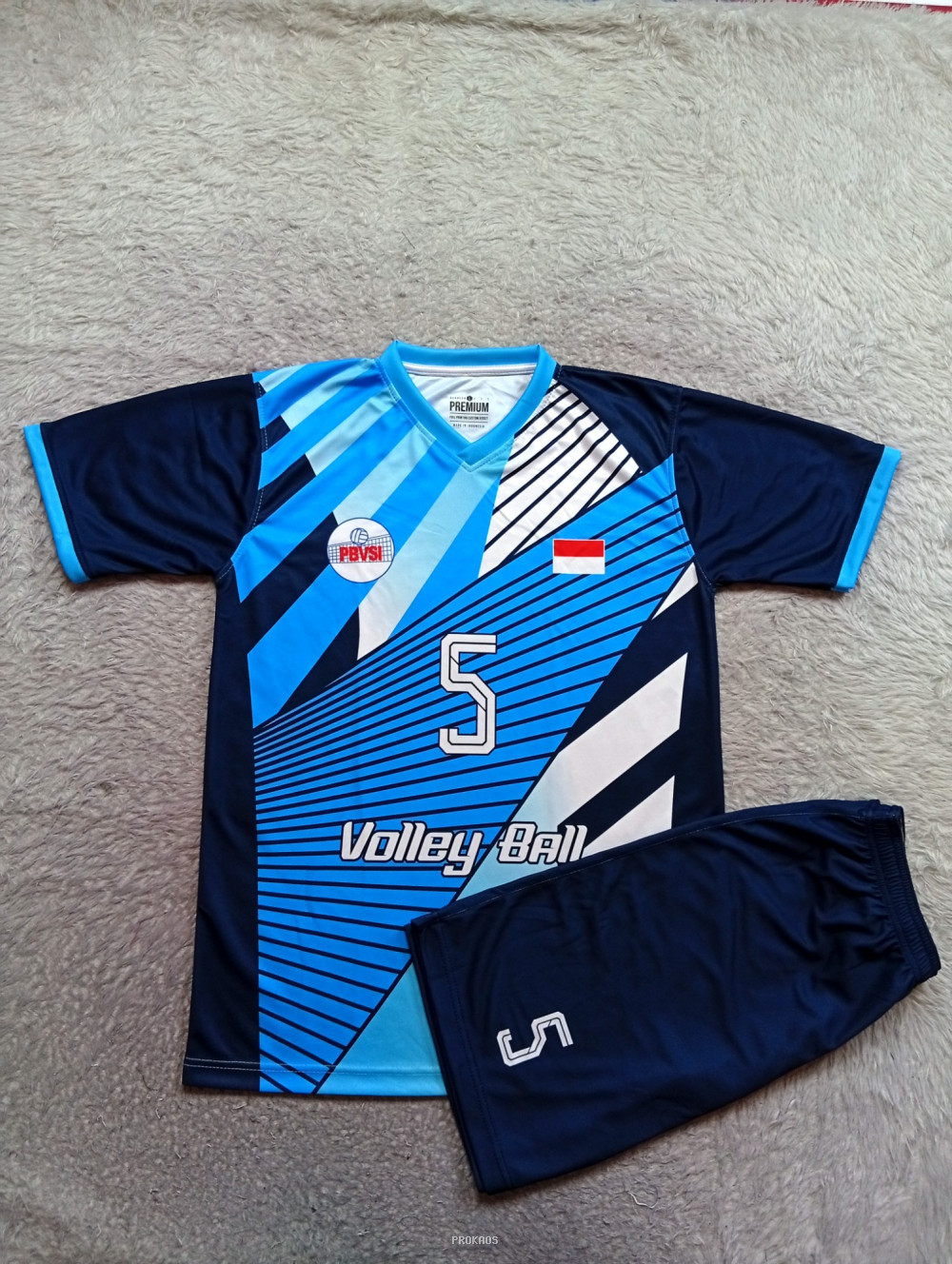 Jersey Voli: Biru, Gelap, & Desain Garis Dinamis - Jersey Custom PROKAOS
