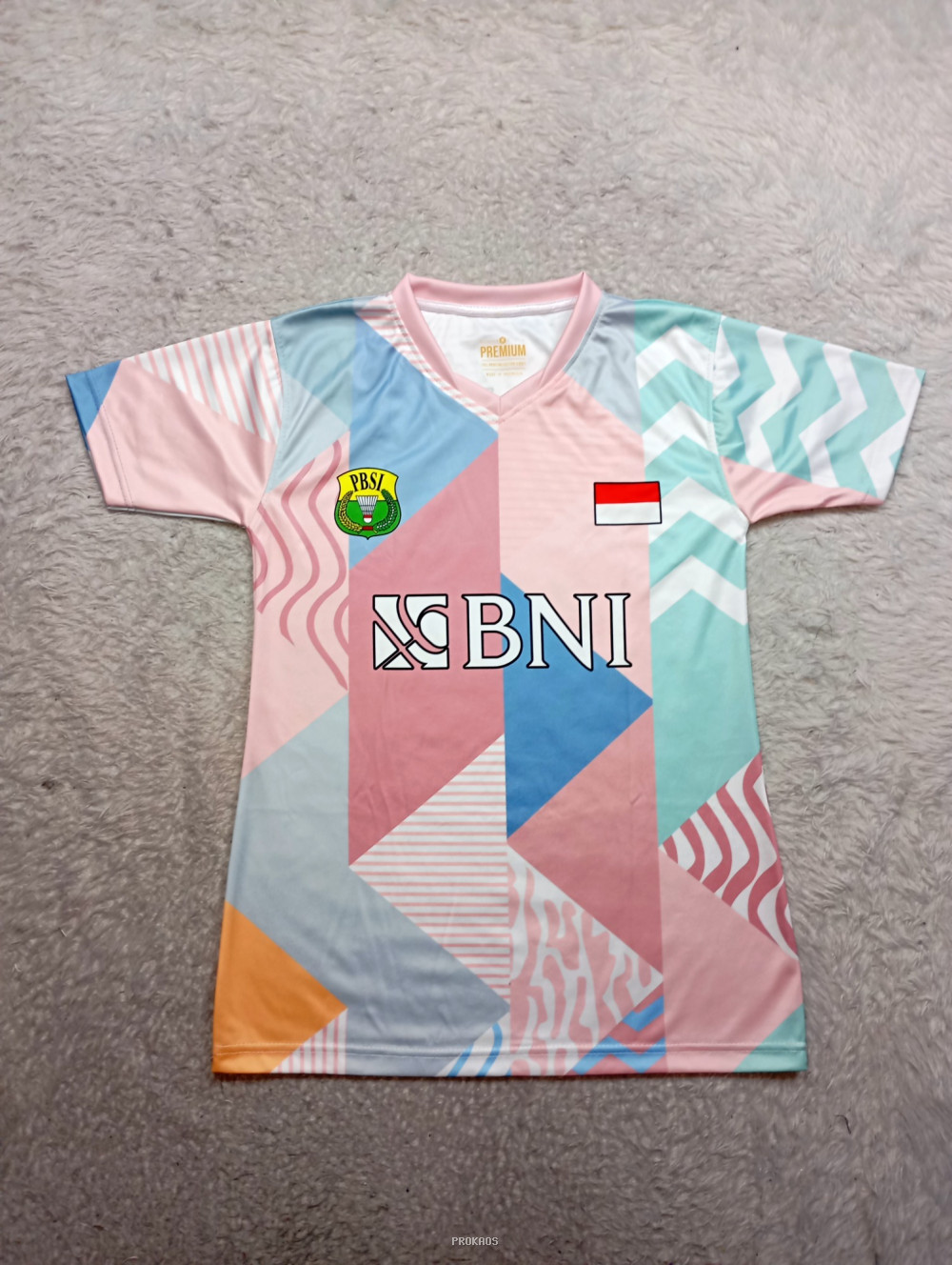 Jersey Badminton Pastel: Desain Geometris & Logo BNI - Jersey Custom PROKAOS