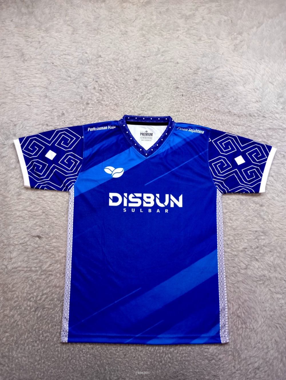 Jersey Biru DISBUN Sulbar dengan Motif Geometris dan Branding - Jersey Custom PROKAOS