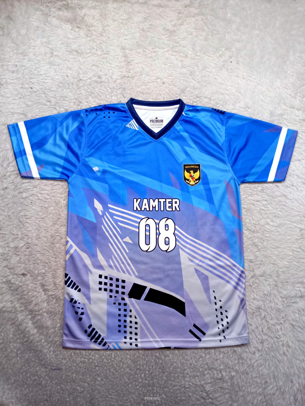 Jersey Kamter 08: Biru-Ungu dengan Lambang Garuda - Jersey Custom PROKAOS