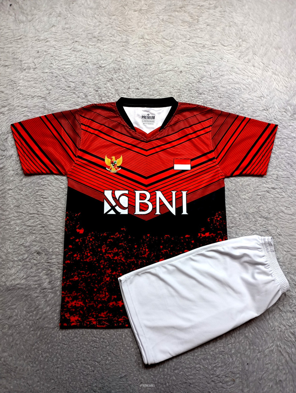 Jersey Merah-Hitam BNI, Garuda, dan Celana Putih - Jersey Custom PROKAOS