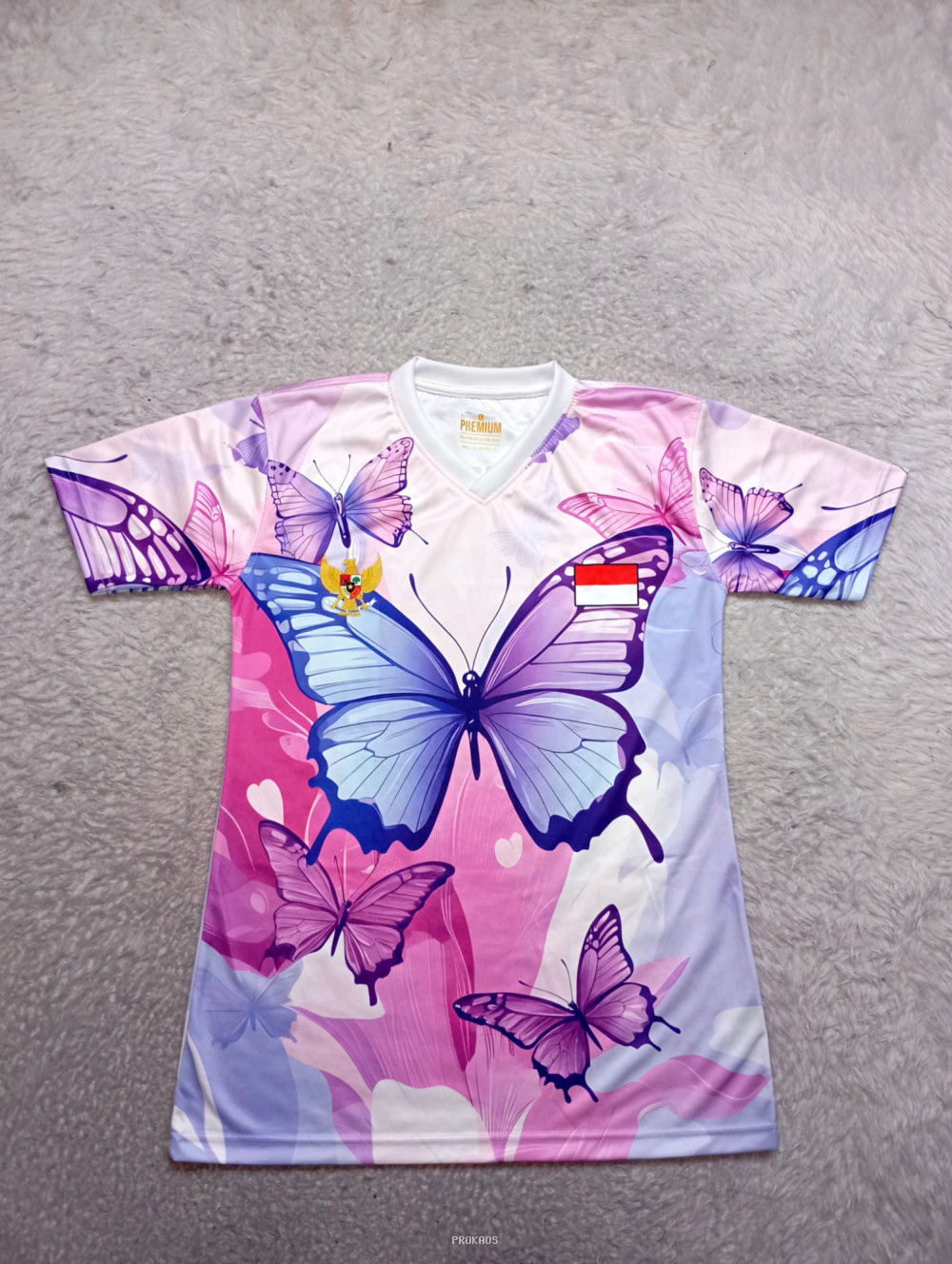 Jersey Motif Kupu-Kupu Merah Putih dengan Lambang Negara - Jersey Custom PROKAOS