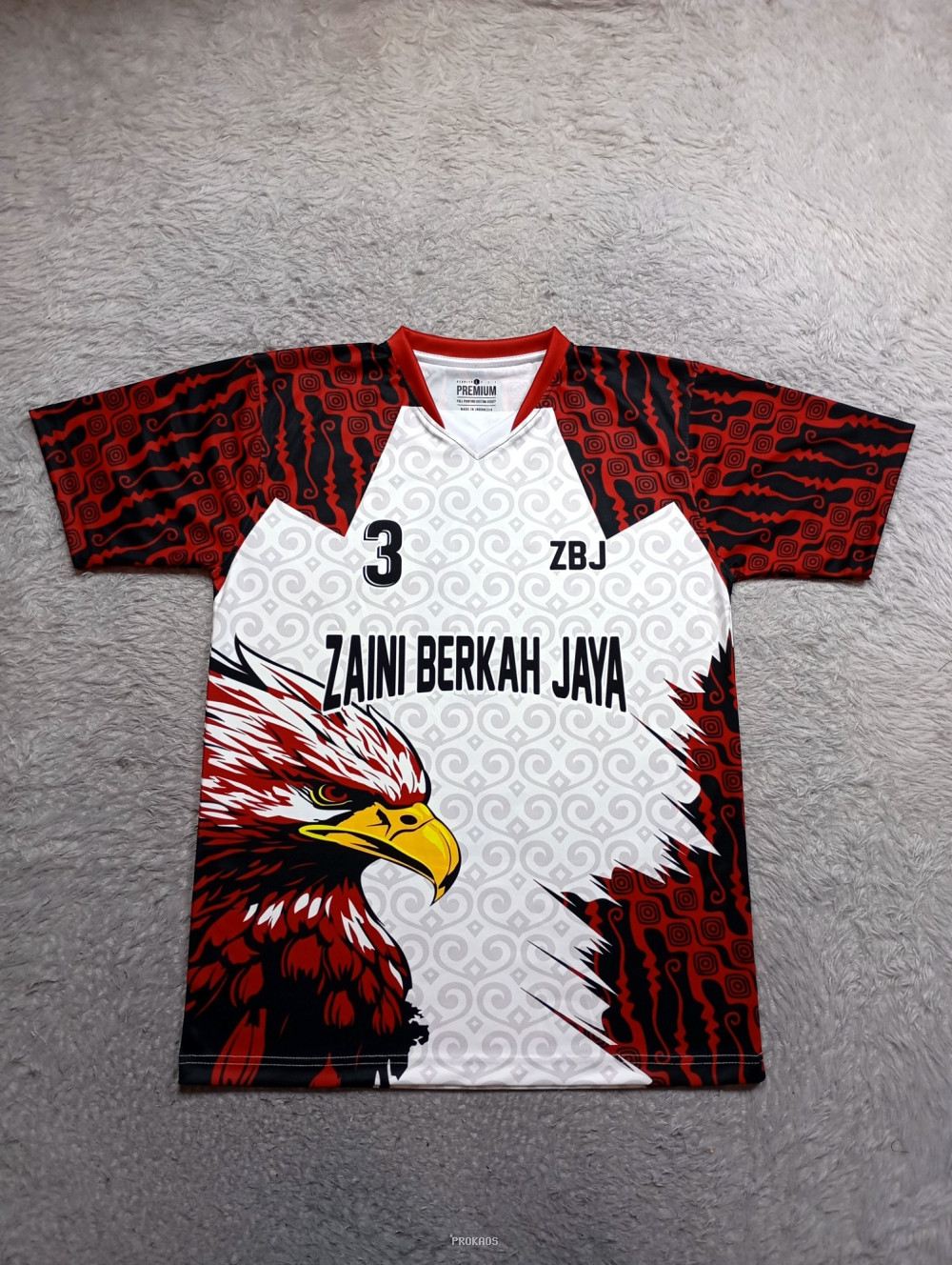 Jersey Olahraga: Zaini Berkah Jaya dengan Desain Elang & Batik - Jersey Custom PROKAOS