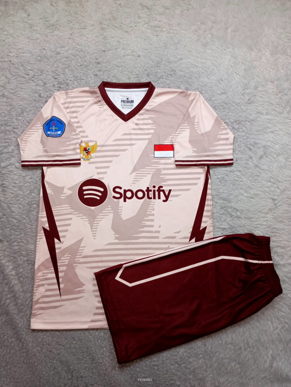 Jersey/Kaos Warna Krem dengan Logo Spotify & Garuda - Jersey Custom PROKAOS