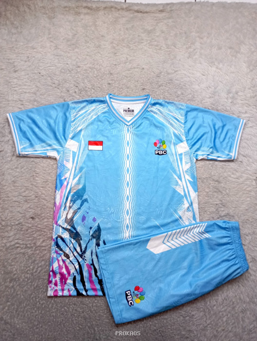 Jersey Biru Muda dengan Motif Abstrak dan Logo PBC - Jersey Custom PROKAOS