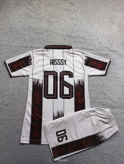 Jersey Bola Grizzly Lady: Putih-Coklat dengan Detail Jangkar - Gambar 2