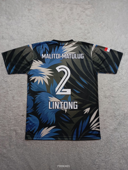 Jersey Voli: Elang Biru di Tengah Rimbun Daun Tropis - Gambar 2